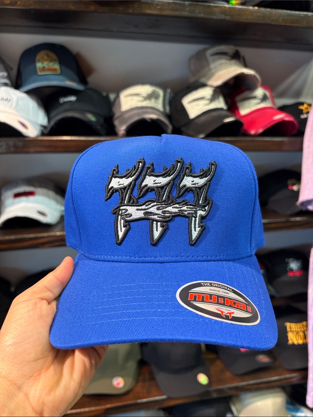 Blue Trucker Hat with Embroidered Logo